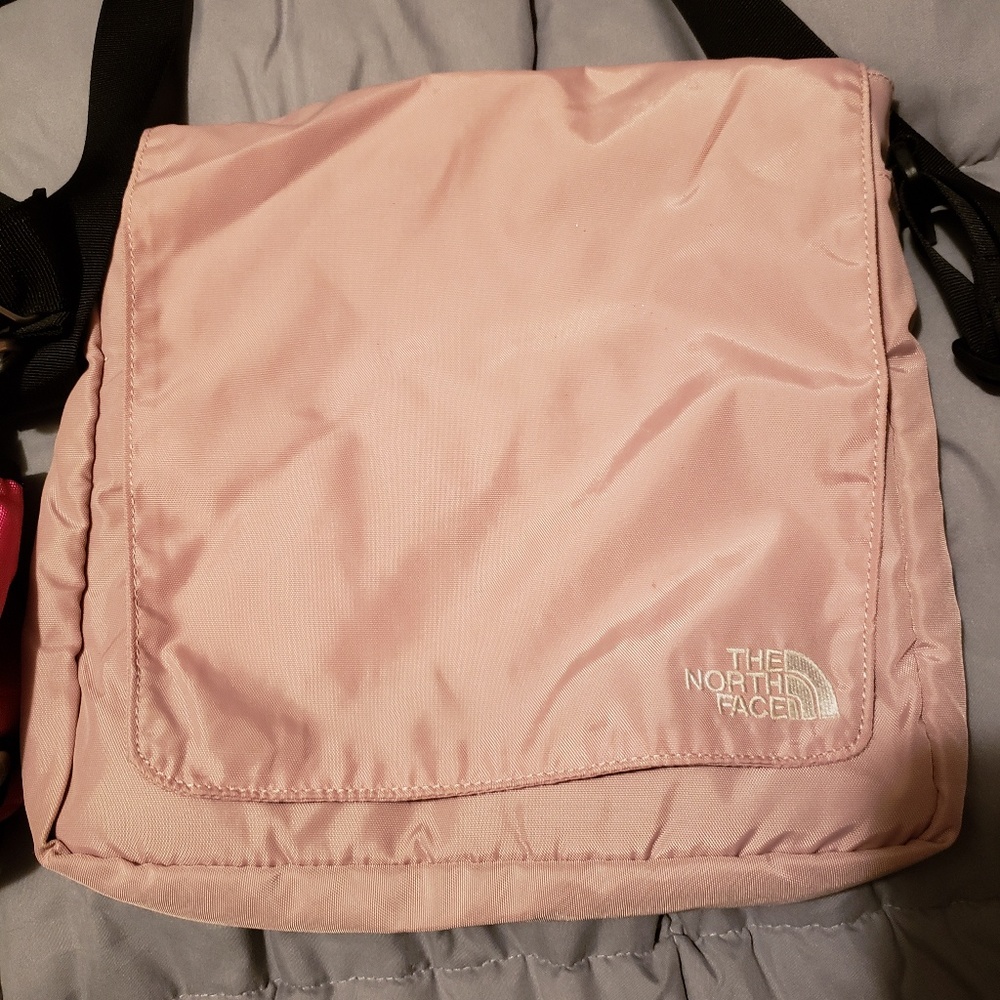 Pink north face messenger bag. EUC.
